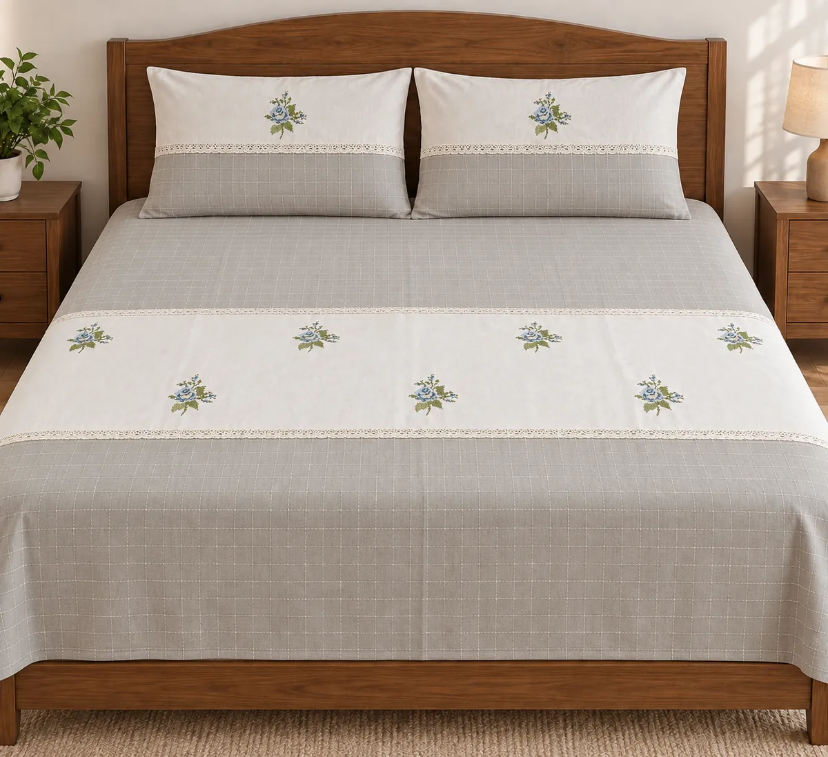 Bed sheets: Blue floral clusters, soft grey checks and delicate lace borders.