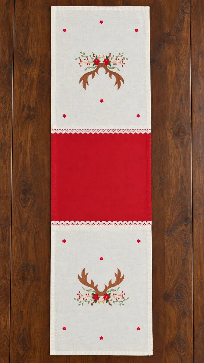Table runners: Antler and berry motifs frame a bold red centre panel.